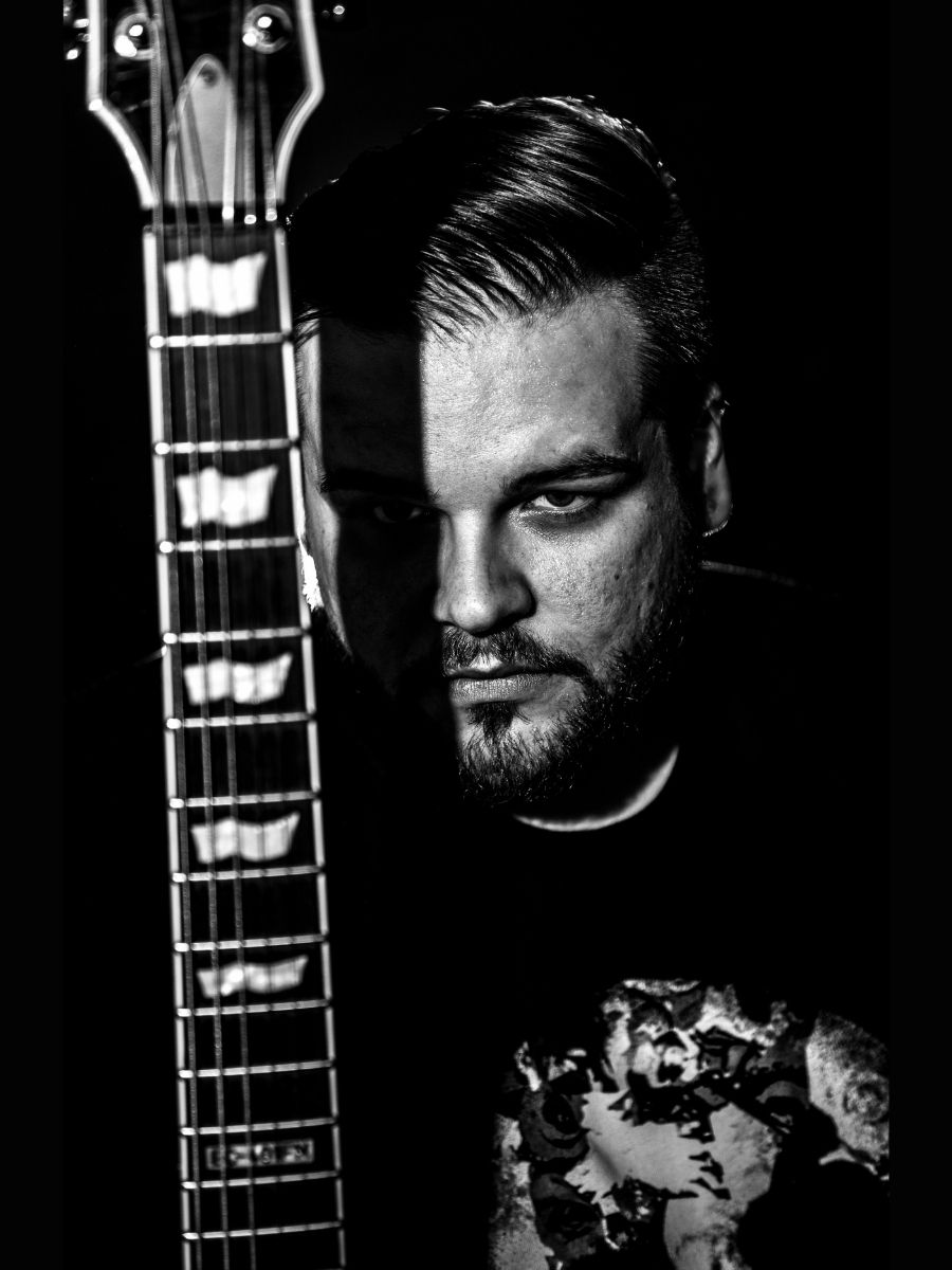 Denis Odobasic — Guitars / Backing Vocals